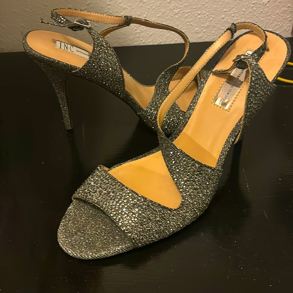 Silver black heels in a size 10 by I.N.C International Concept.